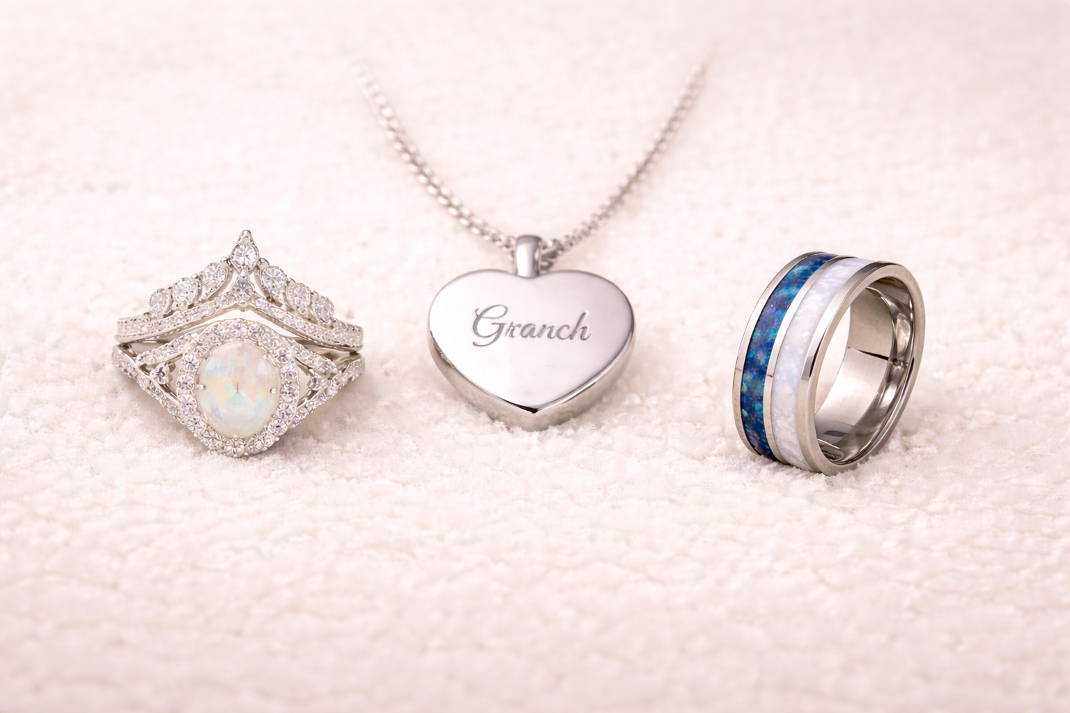 jewelry set featuring engraved heart pendant and gemstone rings