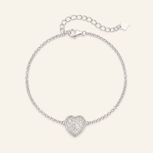 silver chain bracelet with a heart-shaped pavé charm